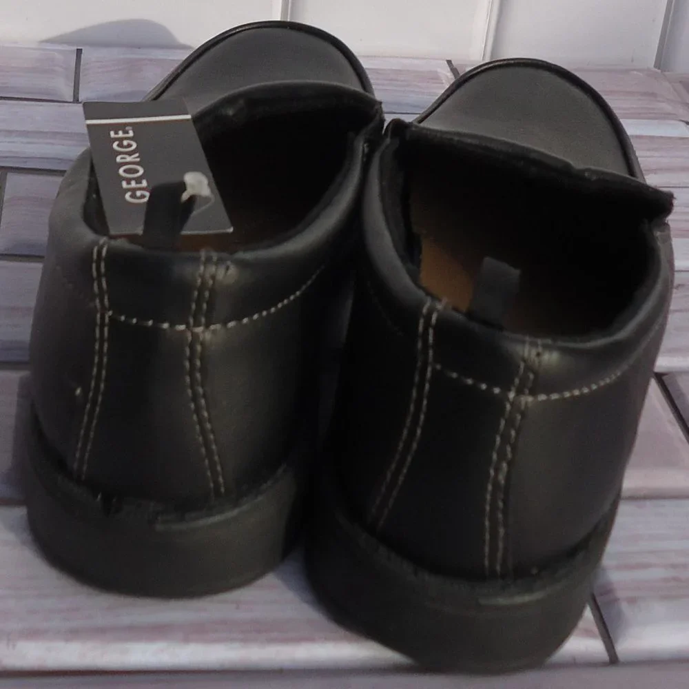 NWT. SIZE 13. George black slip-on formal /dress shoes.